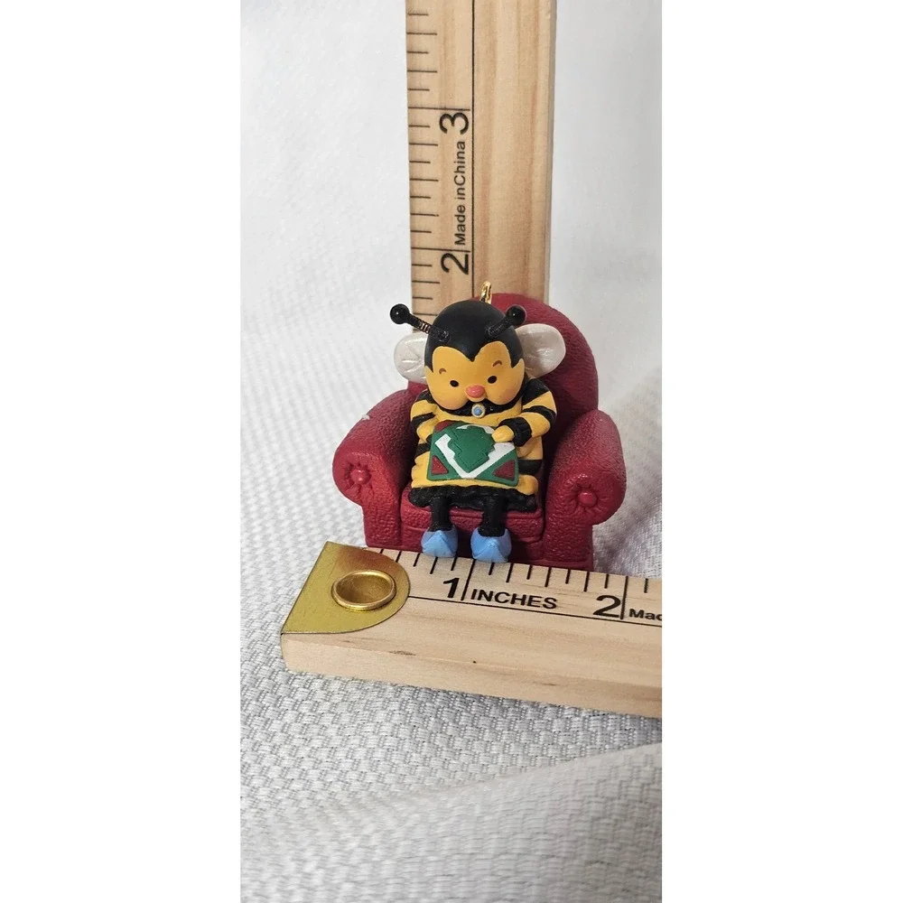 Hallmark Keepsake 1996 Nina Aube Bumble Bee Quilting in Red Chair Ornament